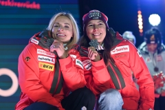 SAALBACH, AUSTRIA, 11.FEB.25 - ALPINE SKIING - TEAM COMBINED, LADIES, MEDAL PLAZA, SIEGEREHRUNG. - FIS ALPINE WORLD SKI CHAMPIONSHIPS SAALBACH 2025
IMAGE  SHOWS :  Lara Gut-Behrami and Wendy Holdener (SUI)
PHOTO: SMP/WINTER